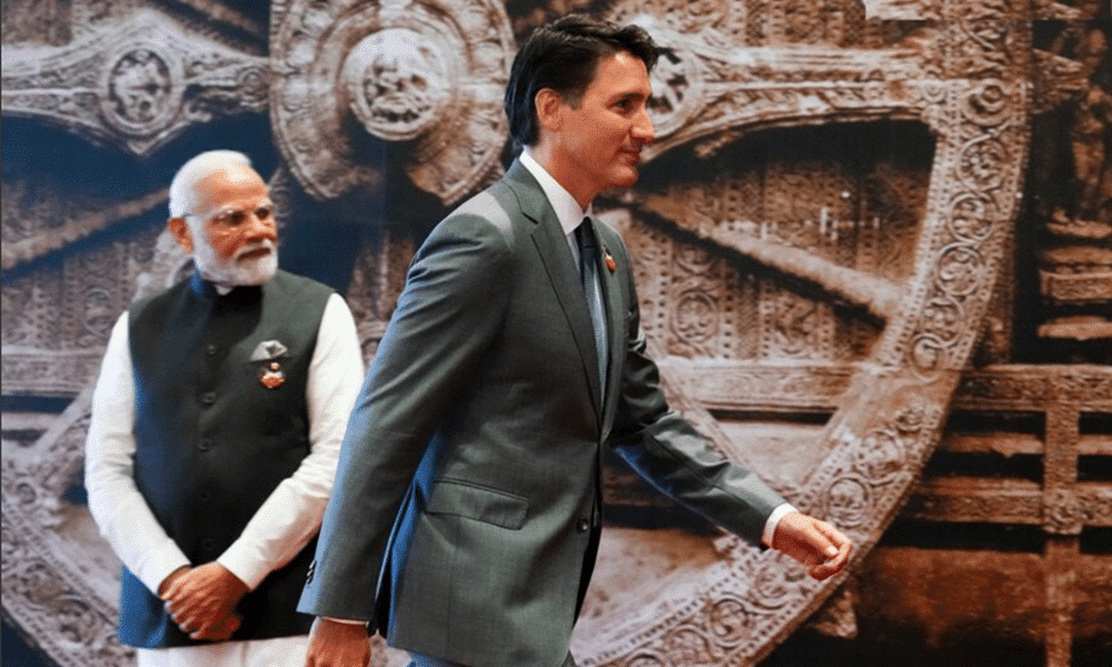 Prime Minister Justin Trudeau leaves a photo op with Mr. Modi - Image Canadian Press