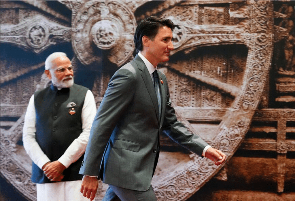 Prime Minister Justin Trudeau leaves a photo op with Mr. Modi - Image Canadian Press