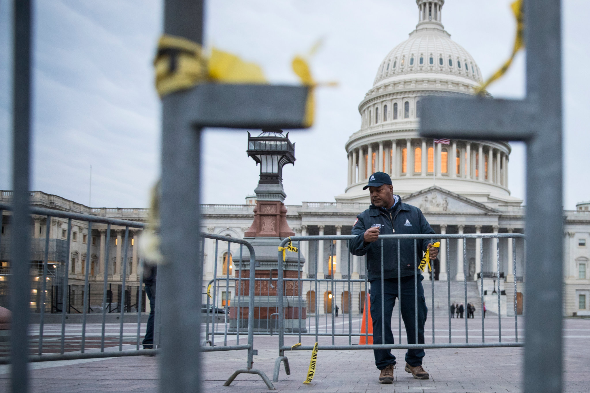 Mass firings of federal workers begin as Trump and Musk purge federal government