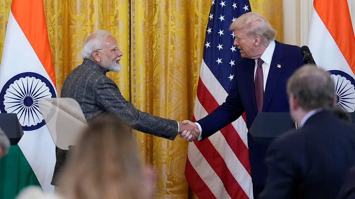 President Donald Trump and India Prime Minister Narendra Modi shake hands during a news conference in the East Room of the White House